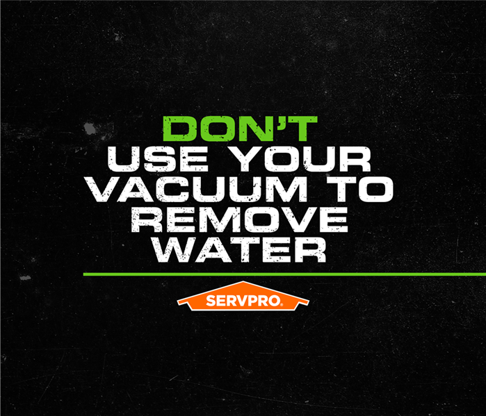 servpro poster do not use a vacuum to remove water